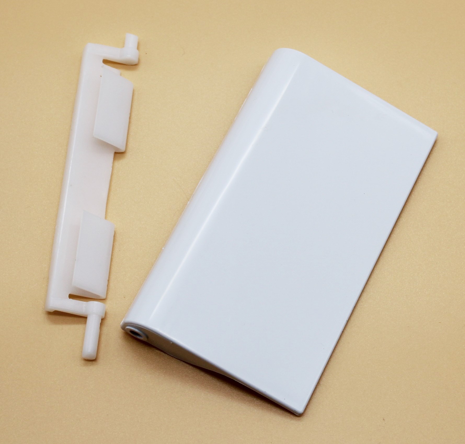 Ручка дверцы морозилки холодильника Атлант 220730108600 + 220730108500