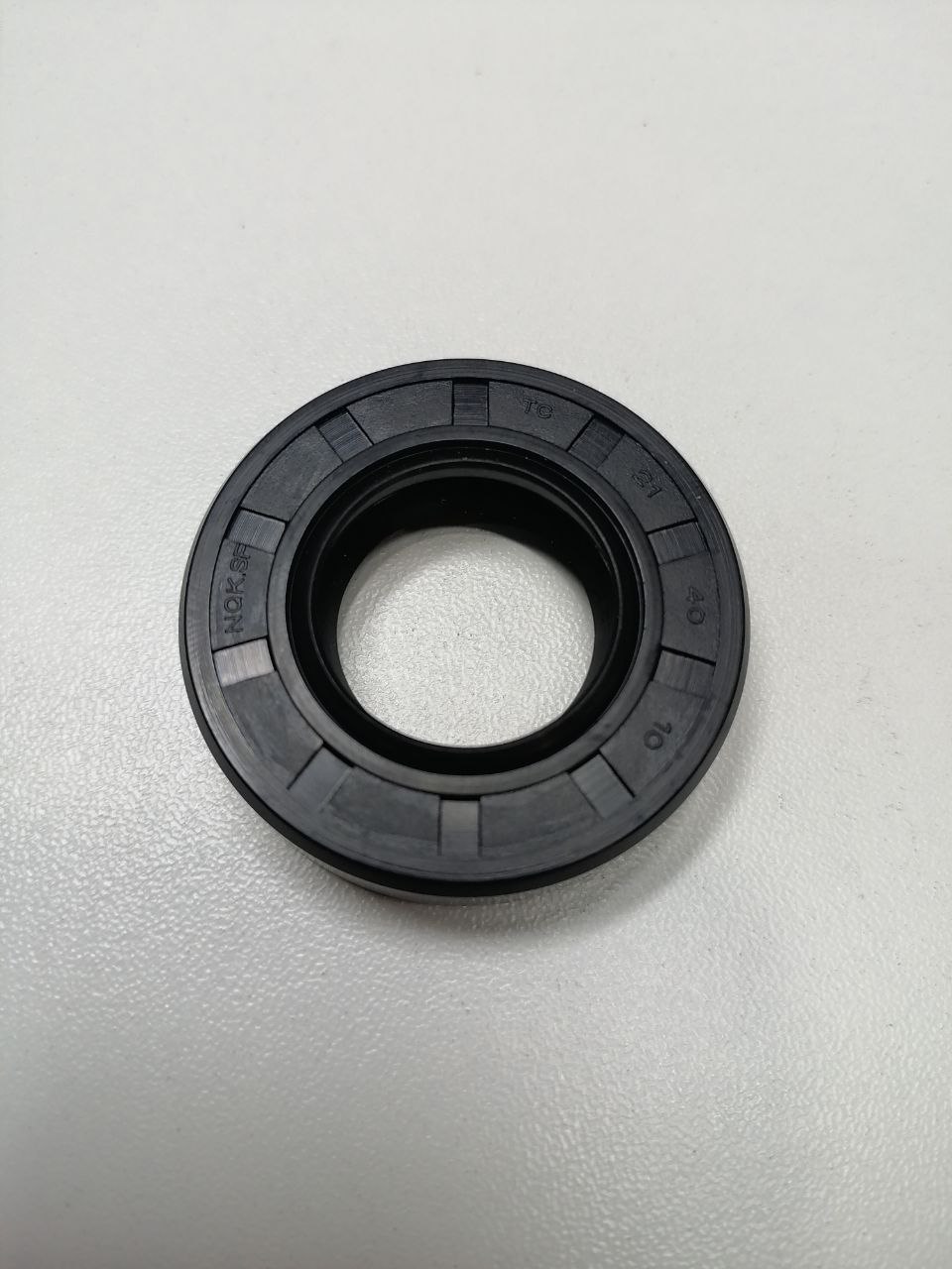 21x40x10 Сальник  NQK.SF