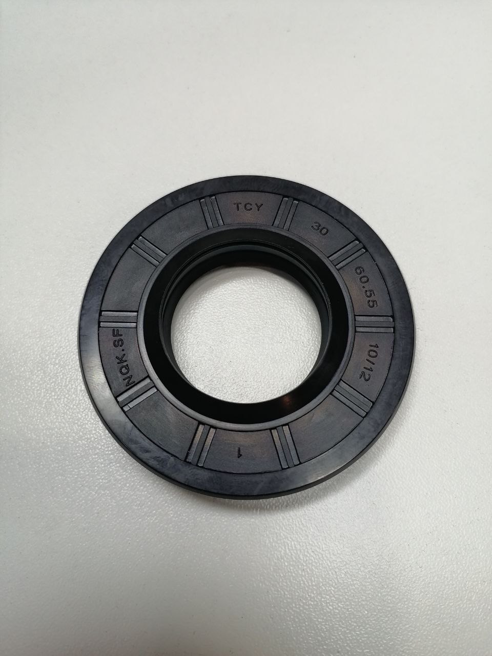 30x60.55x10/12 сальник NQK.SF  TCY NBR SU1002